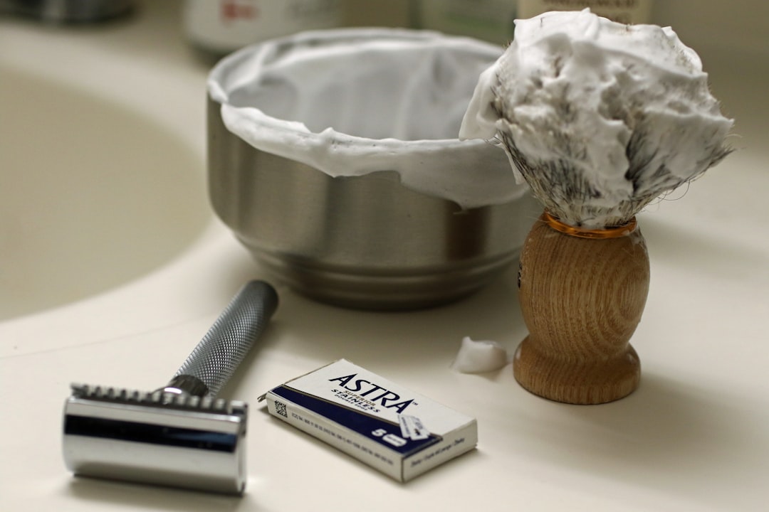 Depilation methods guide with a razor, wax strip, thread, and cream tube on a bathroom counter
