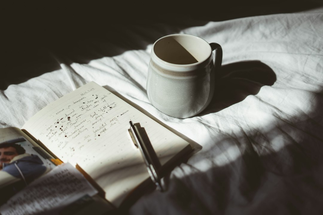 Calming sunrise art for a mental health morning routine with a mug, journal, and gentle light