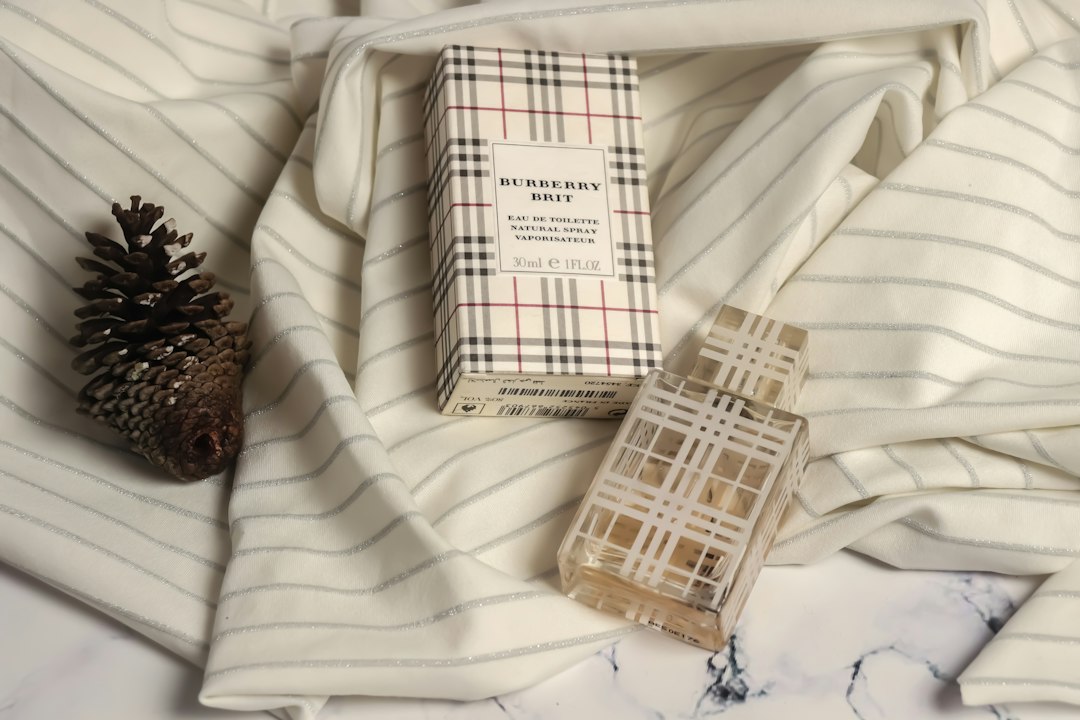 Calm minimalist illustration of a sensitive skin routine with gentle bottles and cotton towel